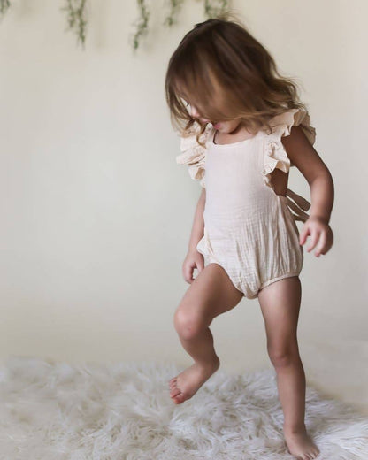 Ruffle Back Romper: Crushed Ivory