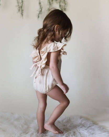 Ruffle Back Romper: Crushed Ivory