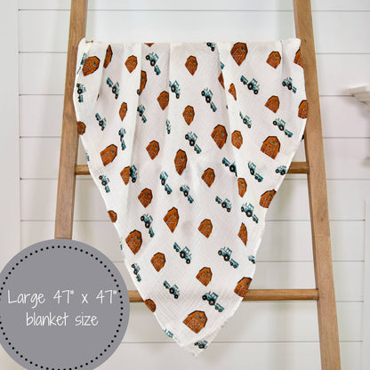 "How We Roll" Muslin Blanket